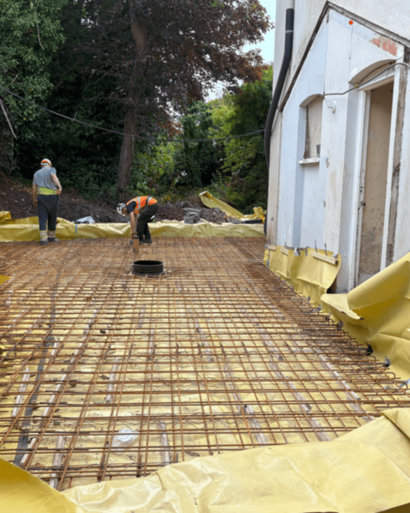 Concrete base, rods being placed ready for concrete slab to be poured